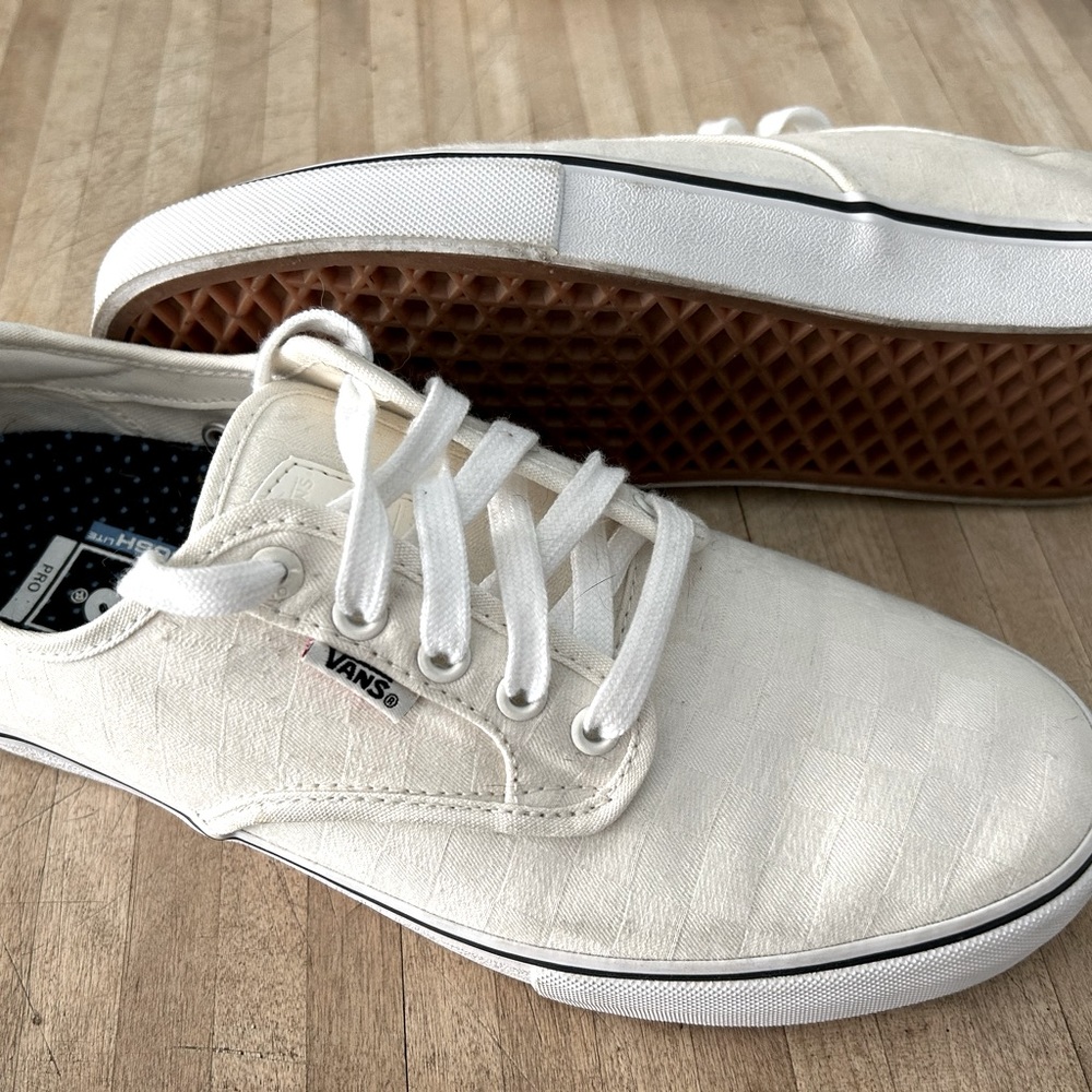 Vans Pro lace-up shoes size 10.5 men’s, off-white with checkerboard pattern.